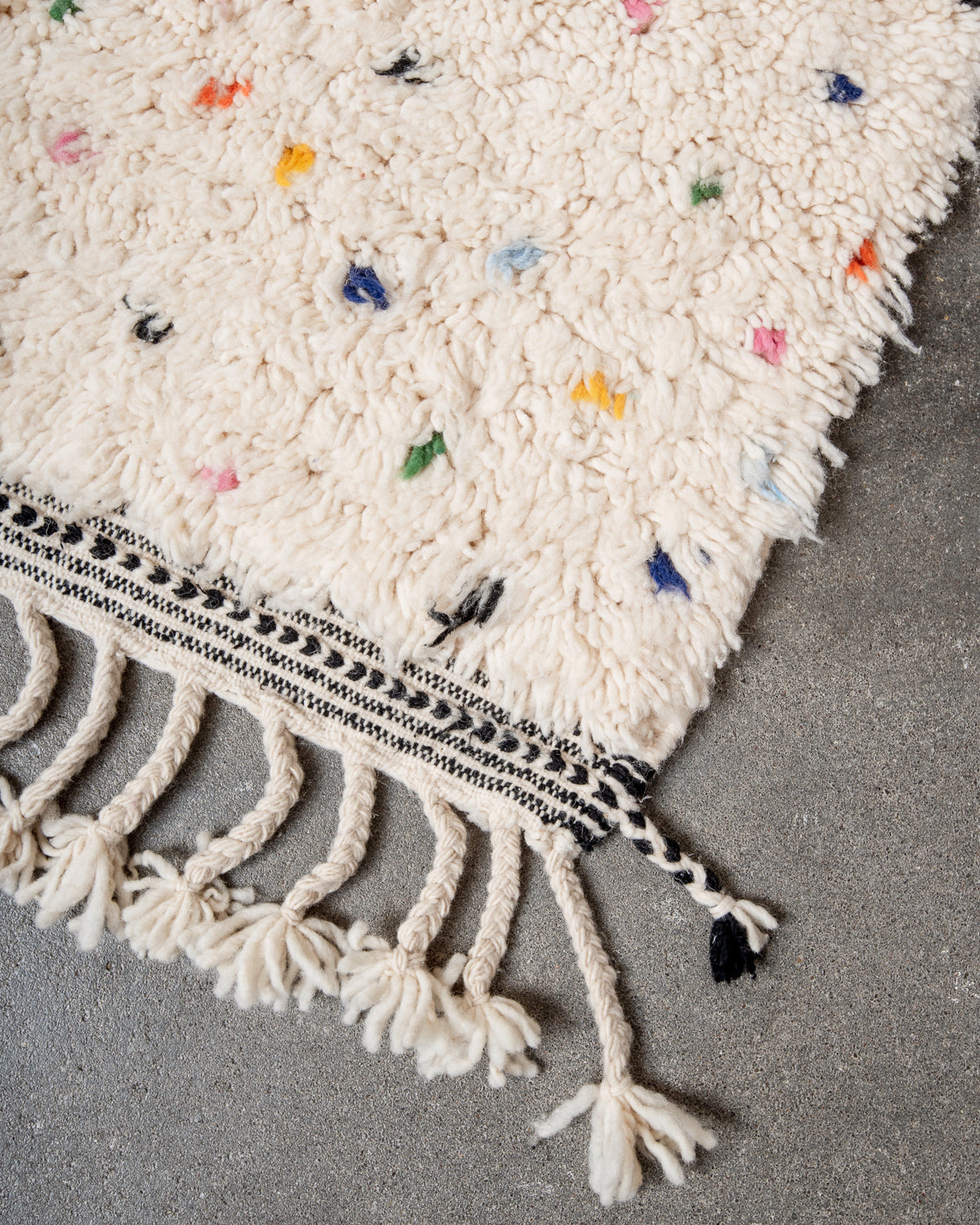 Modern, designer, handcrafted Berber rug from Morocco. Beniourain carpet with beautiful colours and patterns and fluffy wool texture.